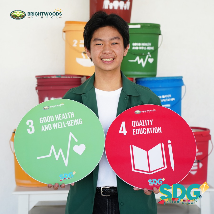A Brightwoods student with the Sustainable Development Goals at the SDG Action Summit