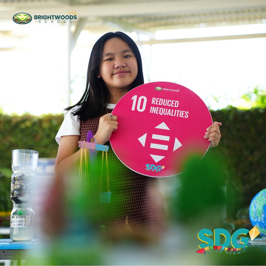 A Brightwoods student with the Sustainable Development Goals at the SDG Action Summit