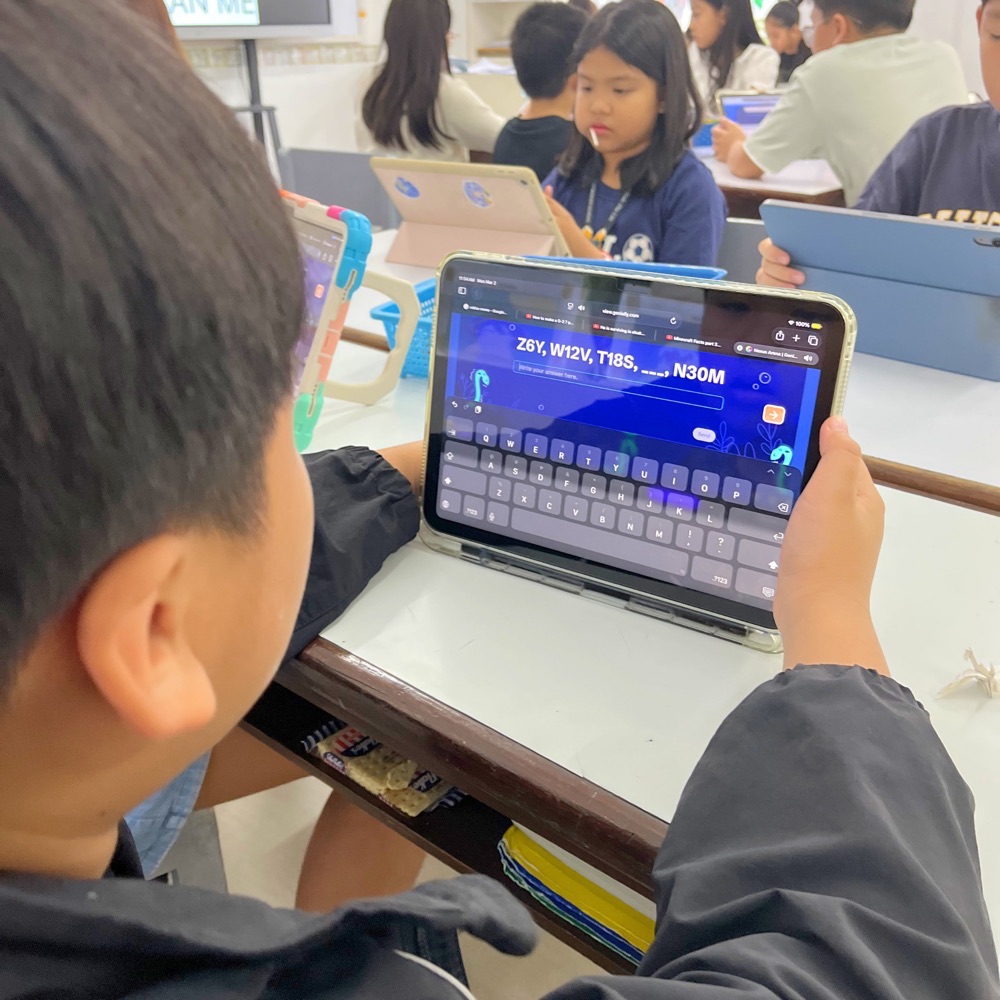 Students using iPads at ImagineX 2026