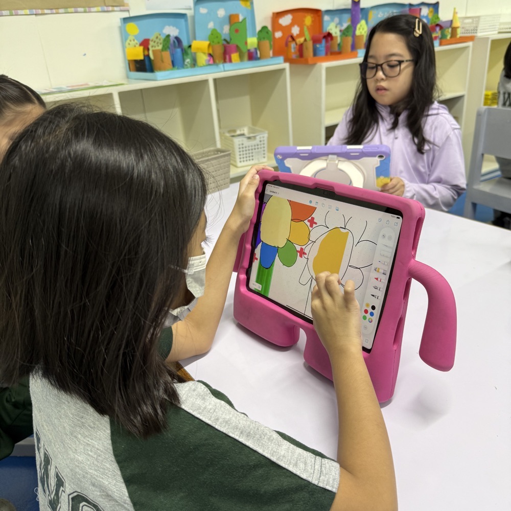 Students using iPads at ImagineX 2026